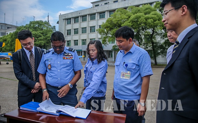 The Commander Accepts Six (6) PT-6 Aircraft from CATIC