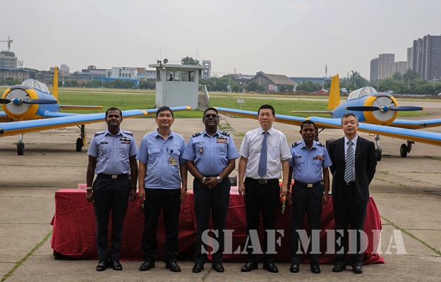 The Commander Accepts Six (6) PT-6 Aircraft from CATIC