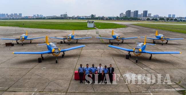 The Commander Accepts Six (6) PT-6 Aircraft from CATIC