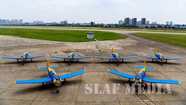 The Commander Accepts Six (6) PT-6 Aircraft from CATIC