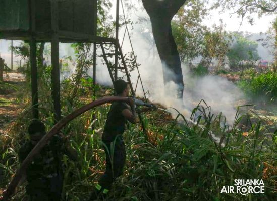 SLAF ASSISTS TO DOUSE THE FIRE IN AMPARA SLTB DEPOT