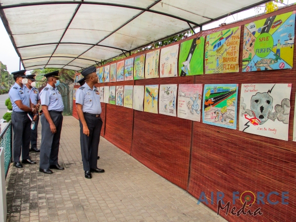FLIGHT
SAFETY POSTER COMPETITION WINNERS RECEIVE AWARDS FROM THE COMMANDER