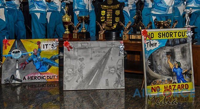 FLIGHT
SAFETY POSTER COMPETITION WINNERS RECEIVE AWARDS FROM THE COMMANDER