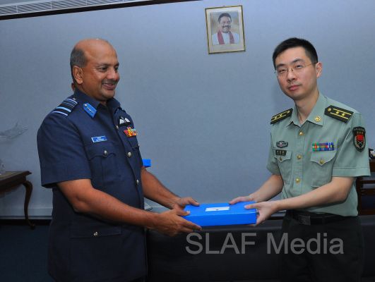 Major General Zhang Long calls on The Commander of The Air Force
