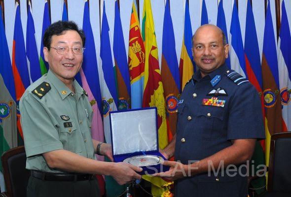 Major General Zhang Long calls on The Commander of The Air Force