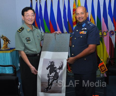 Major General Zhang Long calls on The Commander of The Air Force