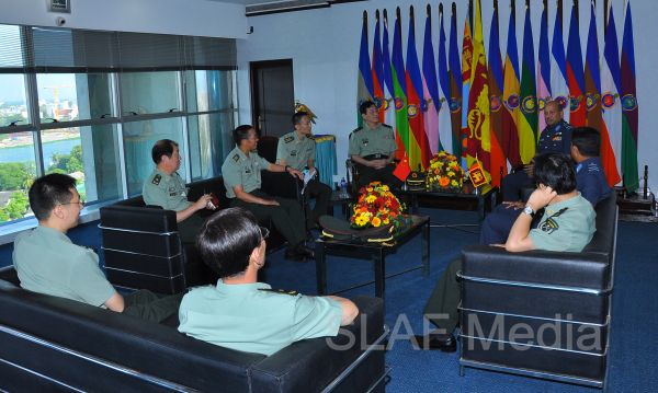 Major General Zhang Long calls on The Commander of The Air Force