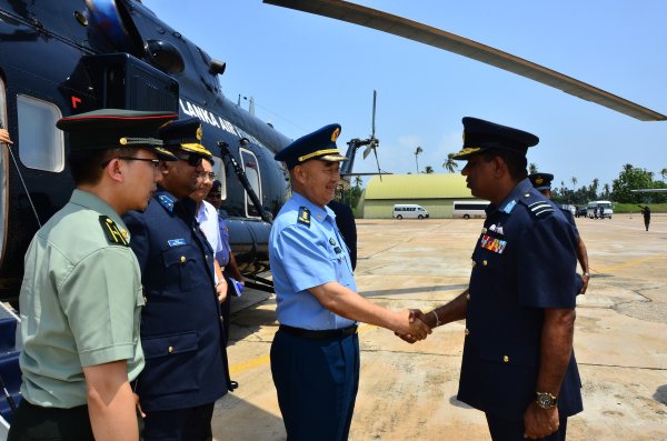 Gen Xu Qi Liang visits sacred Sri Dalada Maligawa and SLAF Base Katunayeka
