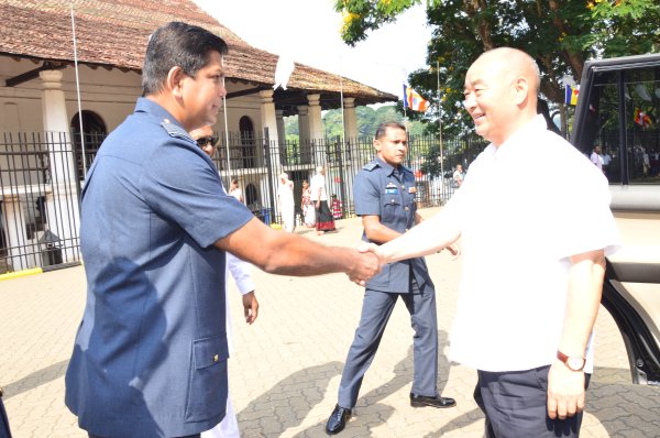 Gen Xu Qi Liang visits sacred Sri Dalada Maligawa and SLAF Base Katunayeka