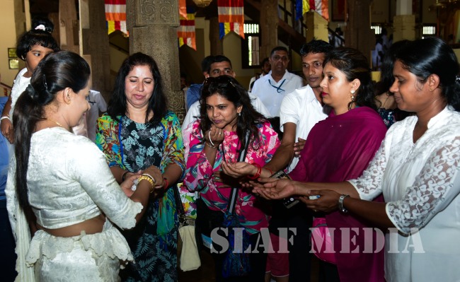 A Religious Ceremony at the Temple of the Sacred Tooth