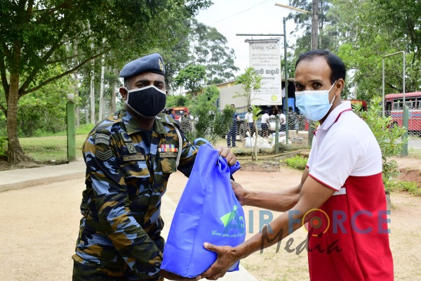 SRI LANKA AIR FORCE COMBAT TRAINING SCHOOL CONVEYS BRICKS TO SACRED SRI PADA