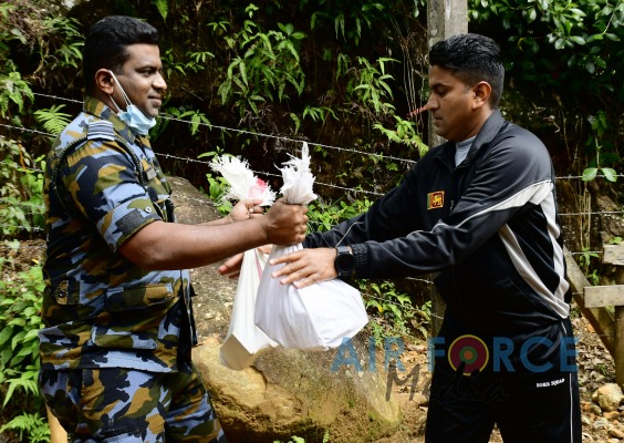 SRI LANKA AIR FORCE COMBAT TRAINING SCHOOL CONVEYS BRICKS TO SACRED SRI PADA