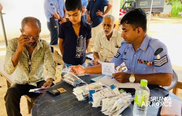 EYE CLINIC AND FREE DISTRIBUTION OF READING GLASSES AT SLAF STATION PALAVI