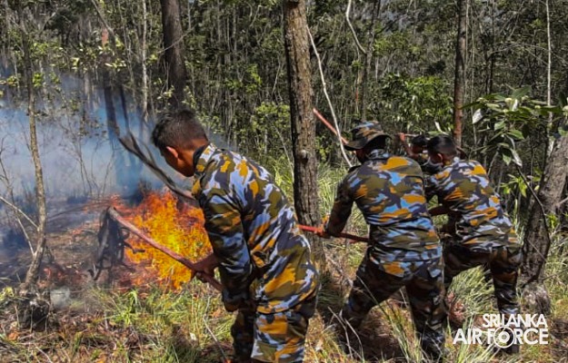 SLAF
ASSISTS TO DOUSE THE FOREST FIRE