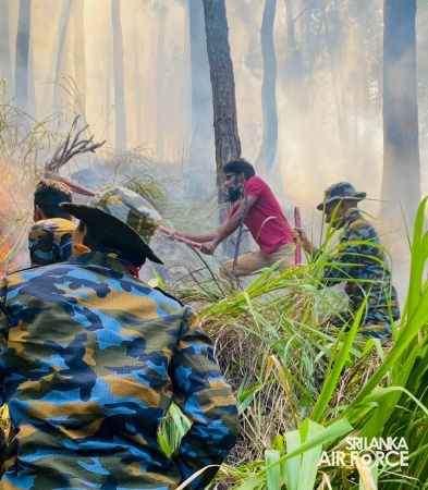 SLAF ASSISTS TO DOUSE THE FOREST FIRE