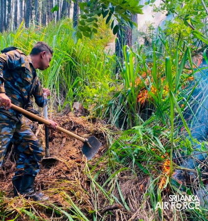 SLAF ASSISTS TO DOUSE THE FOREST FIRE