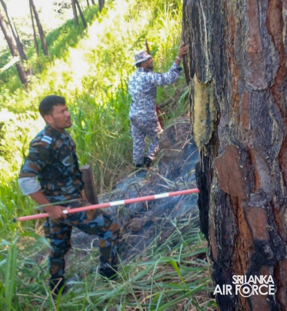 SLAF ASSISTS TO DOUSE THE FOREST FIRE