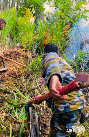 SLAF ASSISTS TO DOUSE THE FOREST FIRE