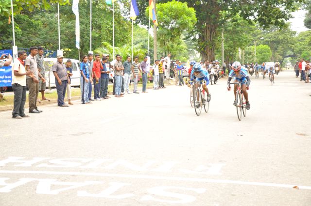 Airman Jeewan Jayasinghe peddles his way to the top at the Maurice Coomerawel Cycle Race