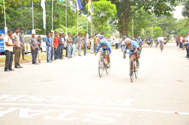 Airman Jeewan Jayasinghe peddles his way to the top at the Maurice Coomerawel Cycle Race