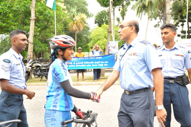 Airman Jeewan Jayasinghe peddles his way to the top at the Maurice Coomerawel Cycle Race