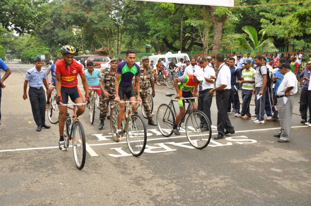 Airman Jeewan Jayasinghe peddles his way to the top at the Maurice Coomerawel Cycle Race