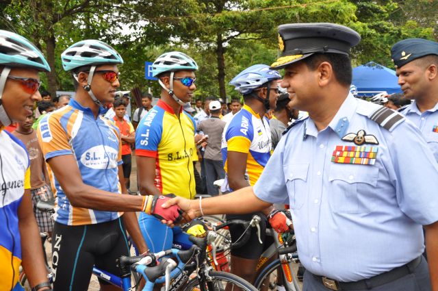 Airman Jeewan Jayasinghe peddles his way to the top at the Maurice Coomerawel Cycle Race