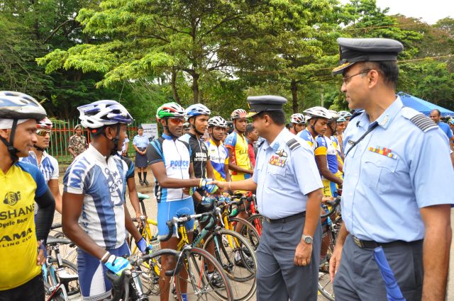 Airman Jeewan Jayasinghe peddles his way to the top at the Maurice Coomerawel Cycle Race