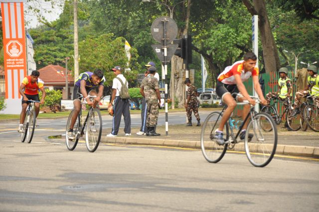 Airman Jeewan Jayasinghe peddles his way to the top at the Maurice Coomerawel Cycle Race