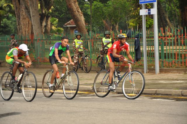 Airman Jeewan Jayasinghe peddles his way to the top at the Maurice Coomerawel Cycle Race