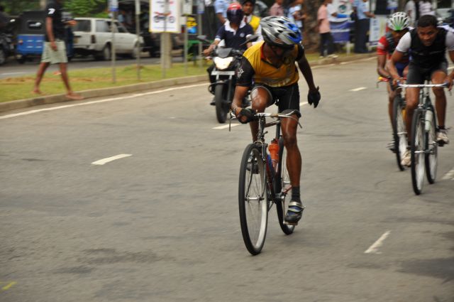 Airman Jeewan Jayasinghe peddles his way to the top at the Maurice Coomerawel Cycle Race