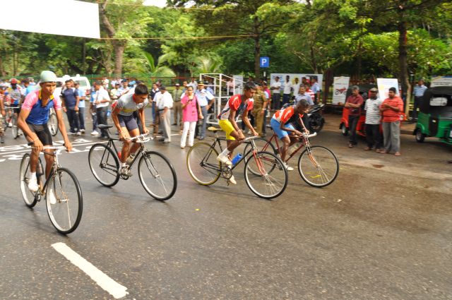 Airman Jeewan Jayasinghe peddles his way to the top at the Maurice Coomerawel Cycle Race