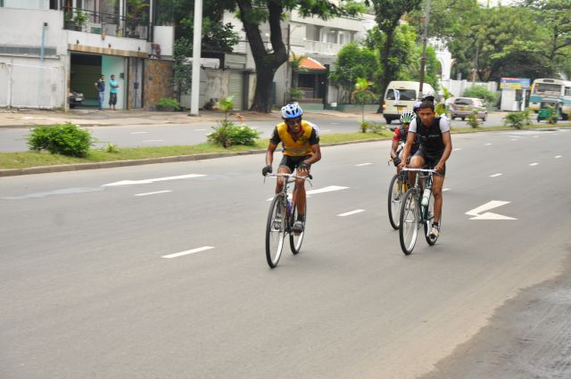 Airman Jeewan Jayasinghe peddles his way to the top at the Maurice Coomerawel Cycle Race