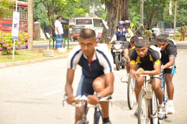Airman Jeewan Jayasinghe peddles his way to the top at the Maurice Coomerawel Cycle Race
