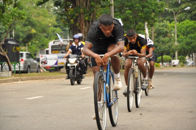 Airman Jeewan Jayasinghe peddles his way to the top at the Maurice Coomerawel Cycle Race
