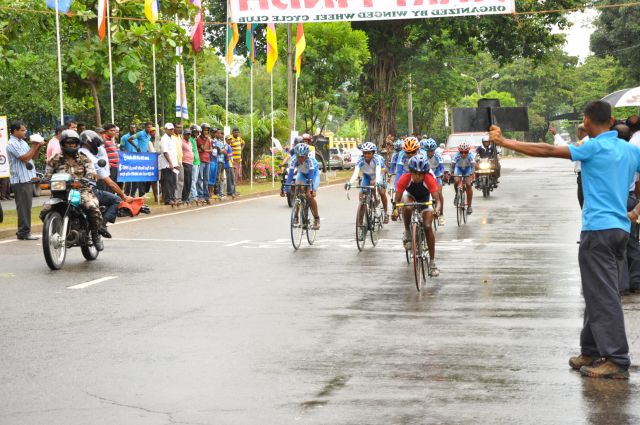 Airman Jeewan Jayasinghe peddles his way to the top at the Maurice Coomerawel Cycle Race