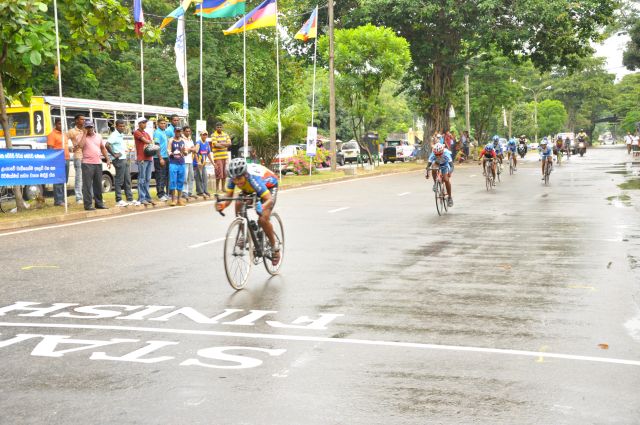 Airman Jeewan Jayasinghe peddles his way to the top at the Maurice Coomerawel Cycle Race