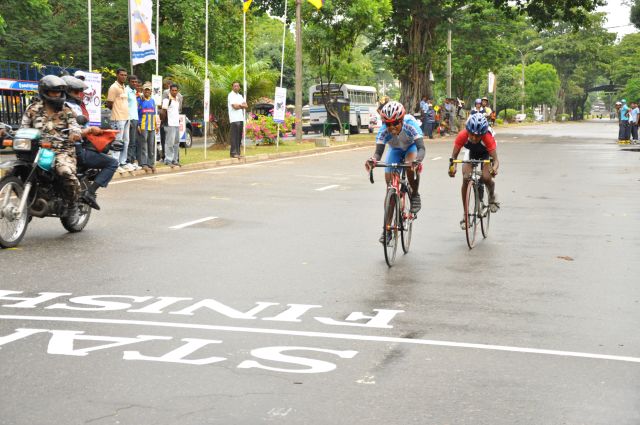 Airman Jeewan Jayasinghe peddles his way to the top at the Maurice Coomerawel Cycle Race