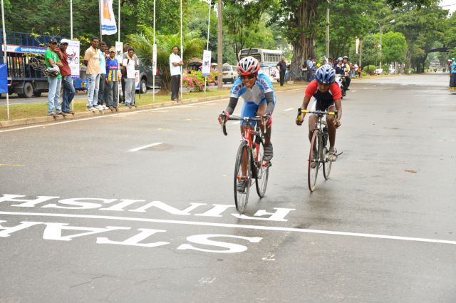 Airman Jeewan Jayasinghe peddles his way to the top at the Maurice Coomerawel Cycle Race
