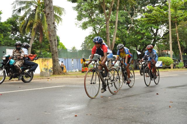 Airman Jeewan Jayasinghe peddles his way to the top at the Maurice Coomerawel Cycle Race