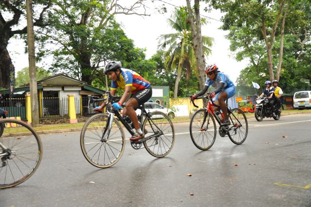 Airman Jeewan Jayasinghe peddles his way to the top at the Maurice Coomerawel Cycle Race
