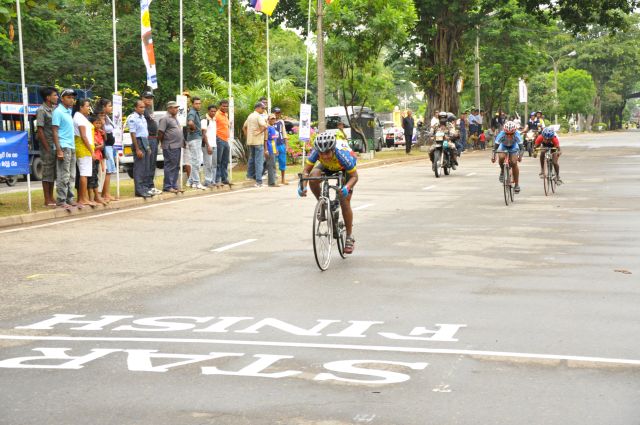 Airman Jeewan Jayasinghe peddles his way to the top at the Maurice Coomerawel Cycle Race