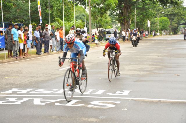 Airman Jeewan Jayasinghe peddles his way to the top at the Maurice Coomerawel Cycle Race