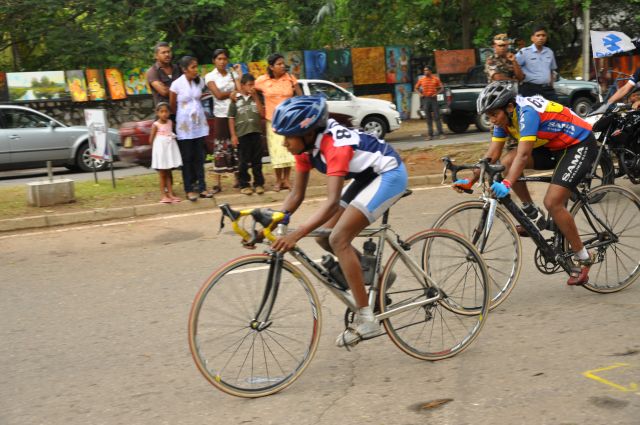 Airman Jeewan Jayasinghe peddles his way to the top at the Maurice Coomerawel Cycle Race