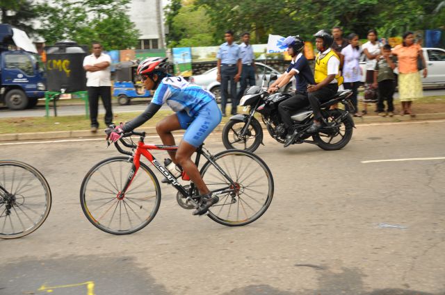 Airman Jeewan Jayasinghe peddles his way to the top at the Maurice Coomerawel Cycle Race