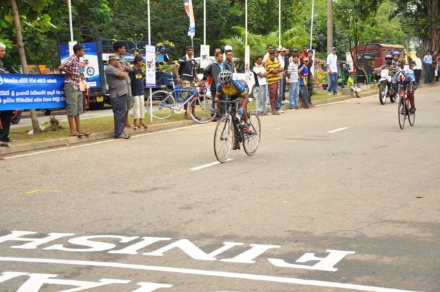 Airman Jeewan Jayasinghe peddles his way to the top at the Maurice Coomerawel Cycle Race