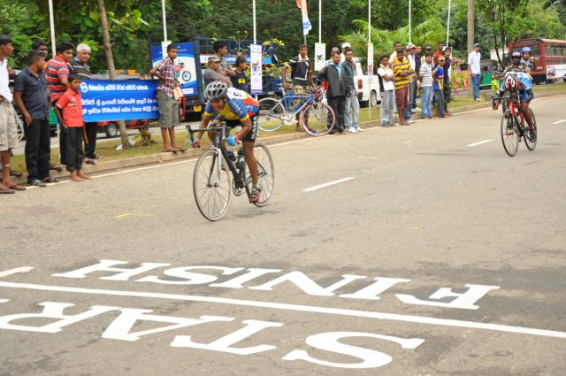 Airman Jeewan Jayasinghe peddles his way to the top at the Maurice Coomerawel Cycle Race