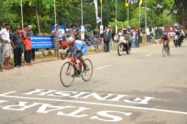 Airman Jeewan Jayasinghe peddles his way to the top at the Maurice Coomerawel Cycle Race