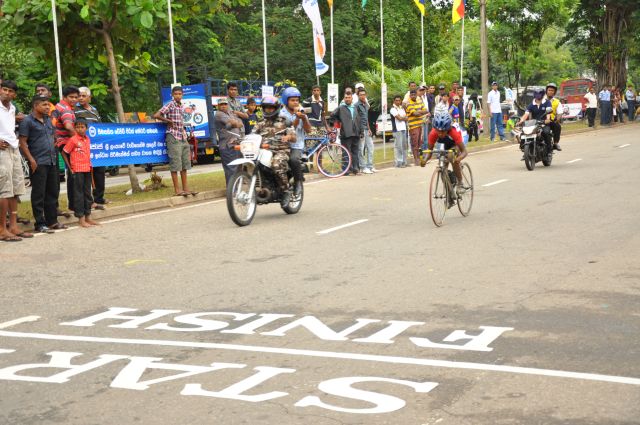 Airman Jeewan Jayasinghe peddles his way to the top at the Maurice Coomerawel Cycle Race