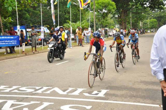 Airman Jeewan Jayasinghe peddles his way to the top at the Maurice Coomerawel Cycle Race